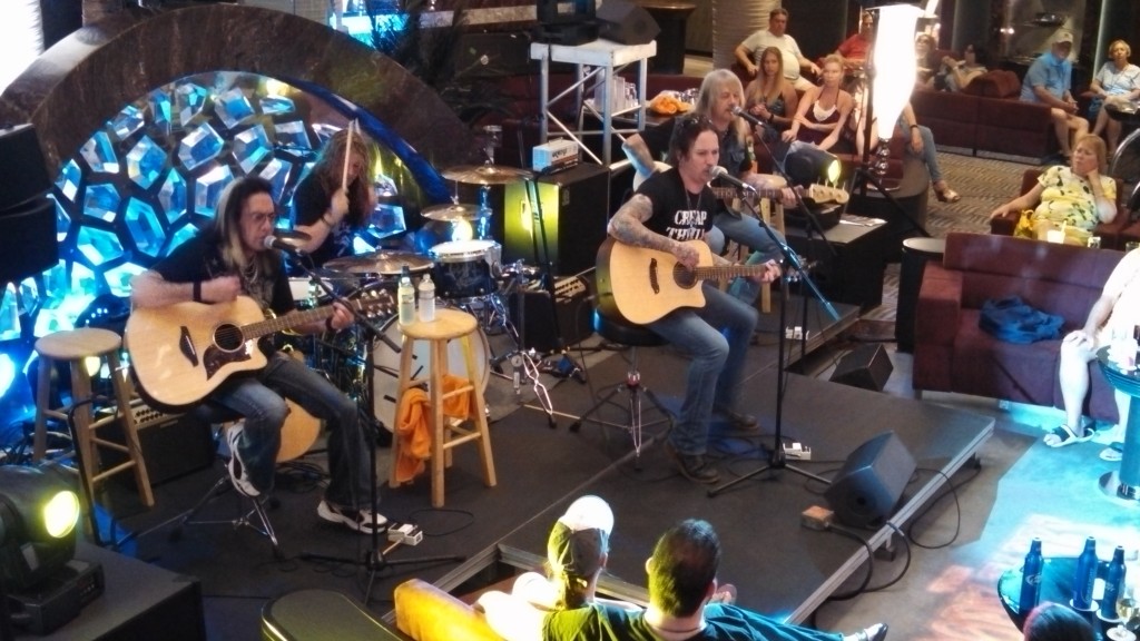 Cheap Thrill performing in the Atrium on the Moody Blues Cruise